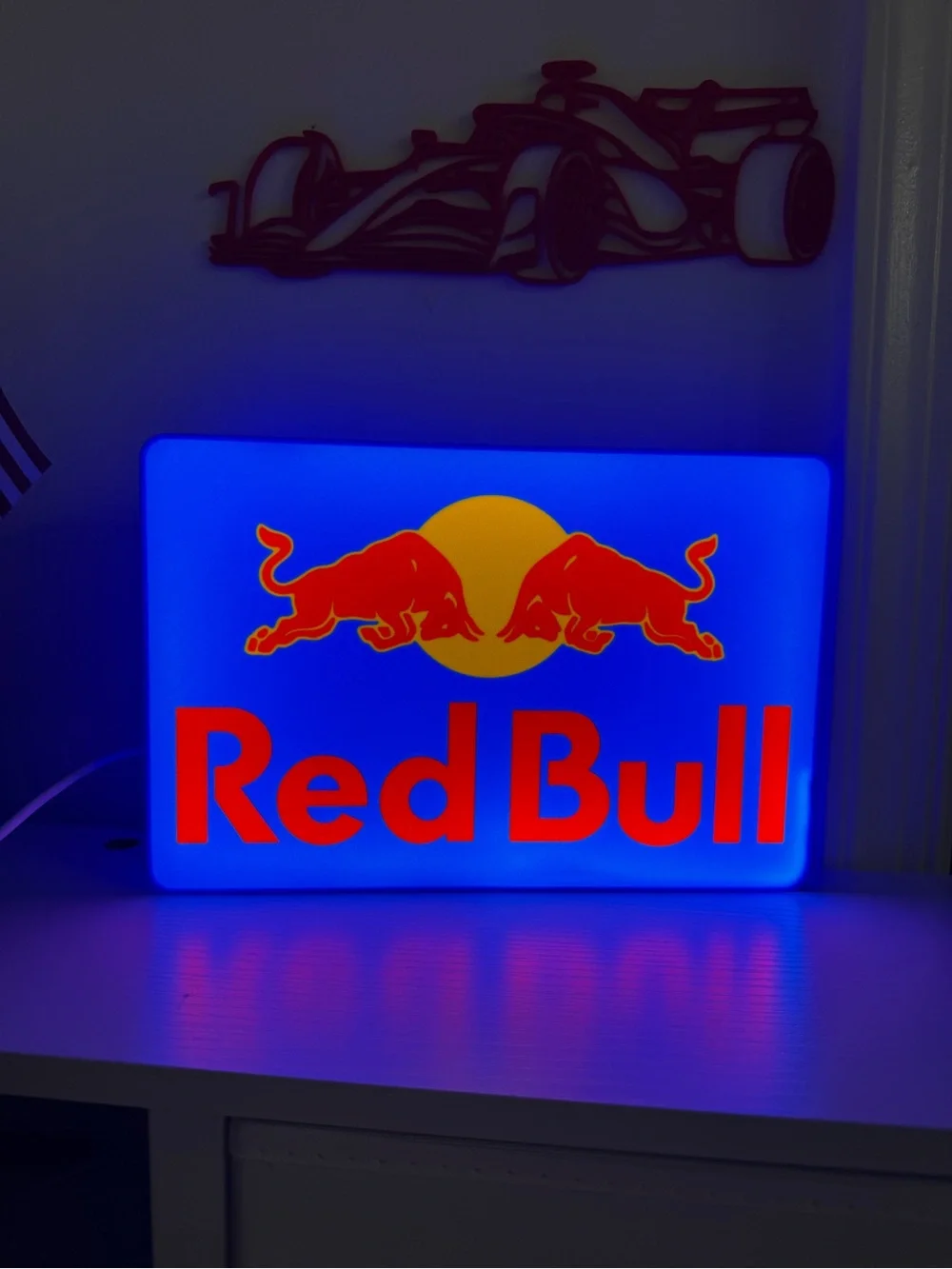 Illuminated Blue and Red Wall Sign - Brand